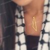 Map of Palestine necklace.