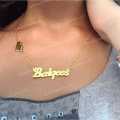 Necklace with custom made name in Arabic or English and a small adjacent heart.